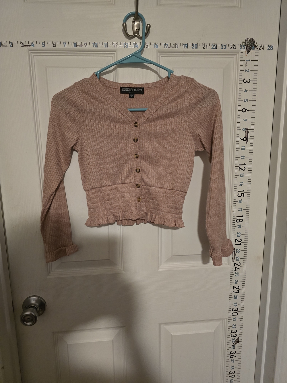 Three Hearts Ribbed V‑Neck Sweater in Dusty Pink